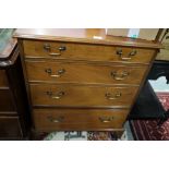 A mahogany chest of four long graduated drawers, on bracket supports, 28" wide