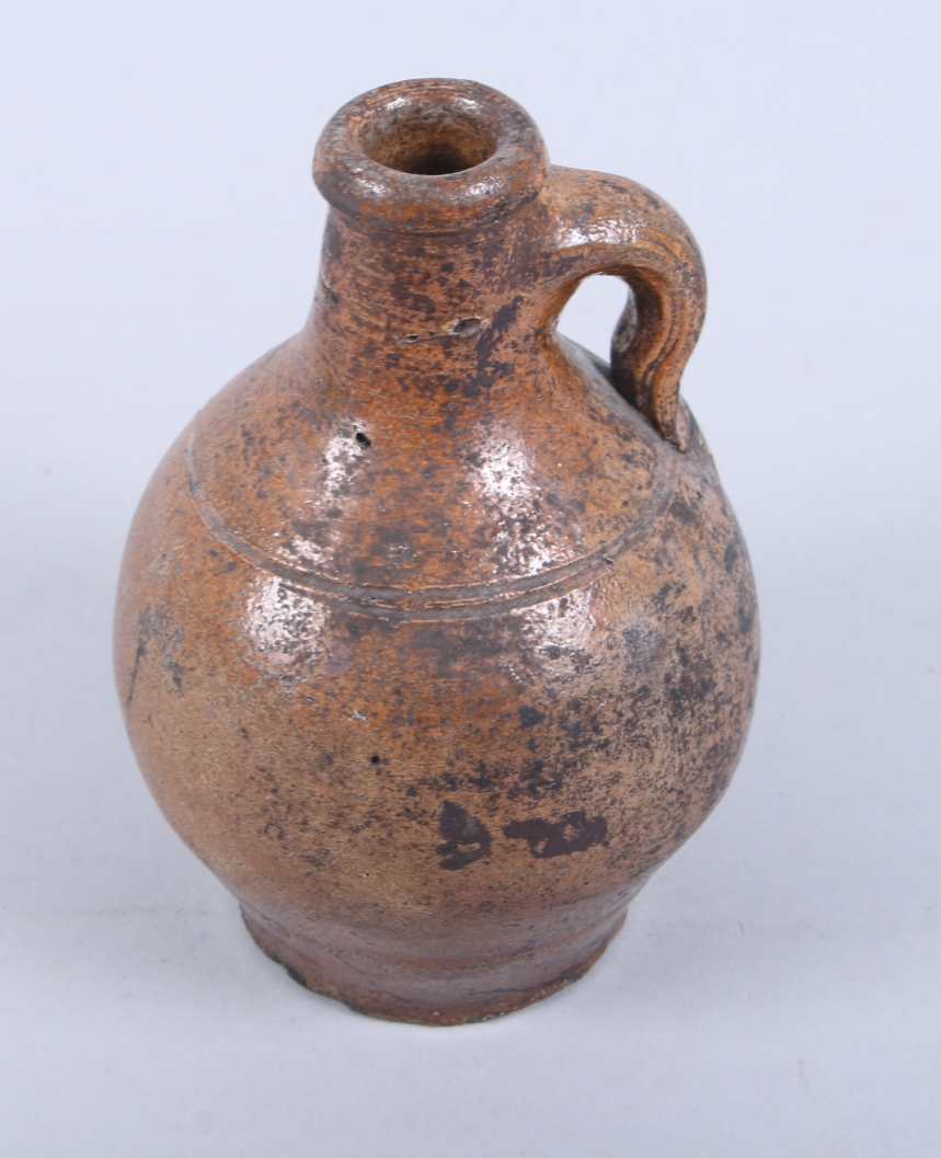 A 17th century Continental brown salt glazed stoneware jug, 6 1/2" high - Image 2 of 4