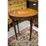 A Sheraton Revival satinwood and painted oval occasional table with classical figures and frieze,