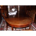 A late 19th century mahogany, box and ebony strung extending dining table with two leaves, on square