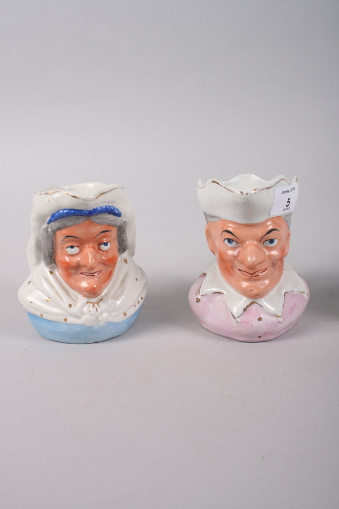 A pair of 19th century porcelain Punch and Judy jugs, 5" high, and a butter dish and cover - Image 2 of 5