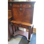 A 19th century French figured mahogany and brass mounted marble top bonheur du jour with drop