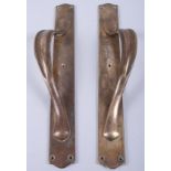 A pair of late 19th century Art Nouveau brass scrollwork door handles, 17 1/4" long