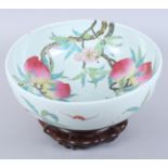 A Chinese porcelain punch bowl, decorated bats and peaches, seal mark to base, 12" dia, on