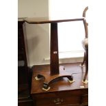 A 19th century mahogany octagonal top occasional table, on tapering column and quadruple splay base,