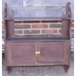 A late Victorian oak wall cupboard with shelf over two doors, 24" wide