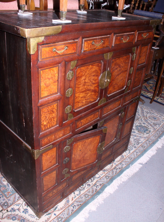An antique Korean mulberry and hardwood side cabinet, fitted four drawers over two cupboards with
