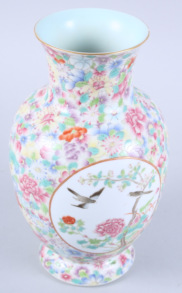 A Chinese porcelain baluster vase, decorated two panels of birds on a millefiori ground, seal mark - Image 5 of 11