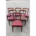 A set of six 19th century mahogany standard bar back dining chairs, upholstered in a red