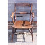 A 19th century Oxford bar back elbow chair with panel seat