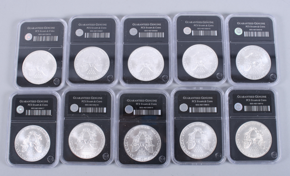 A part set of uncirculated American Eagle 1oz pure silver dollars, in wooden case - Image 18 of 20