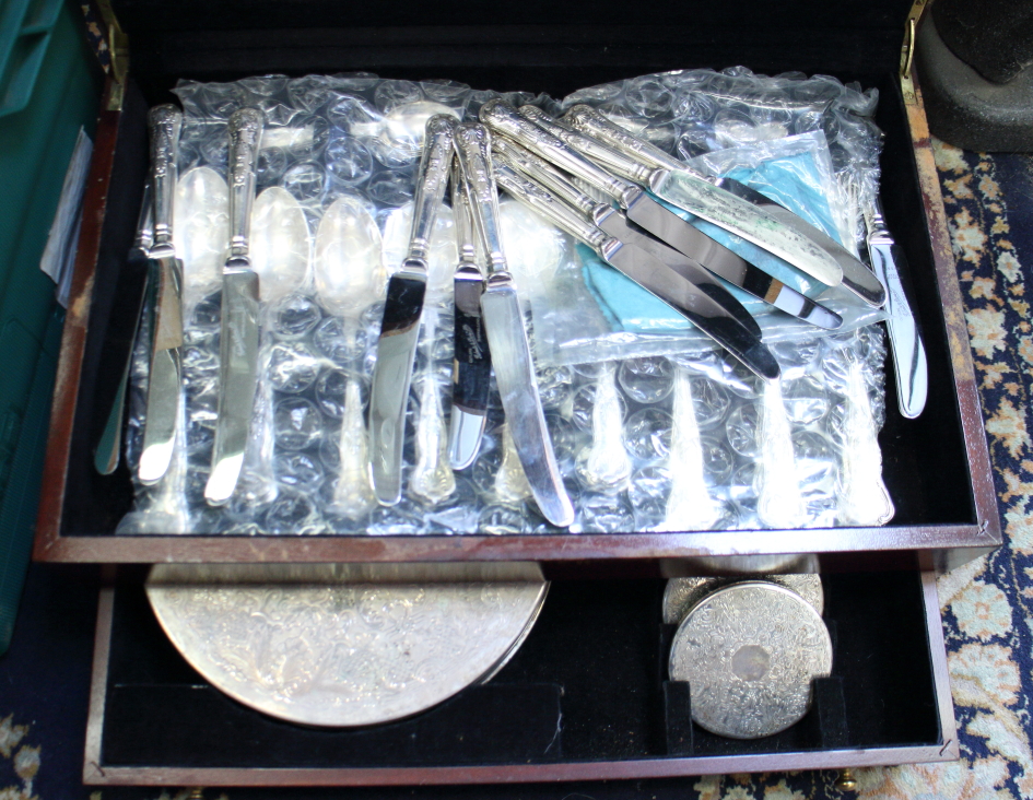 A canteen of silver plated Roberts and Dore cutlery and tableware, in polished as mahogany case