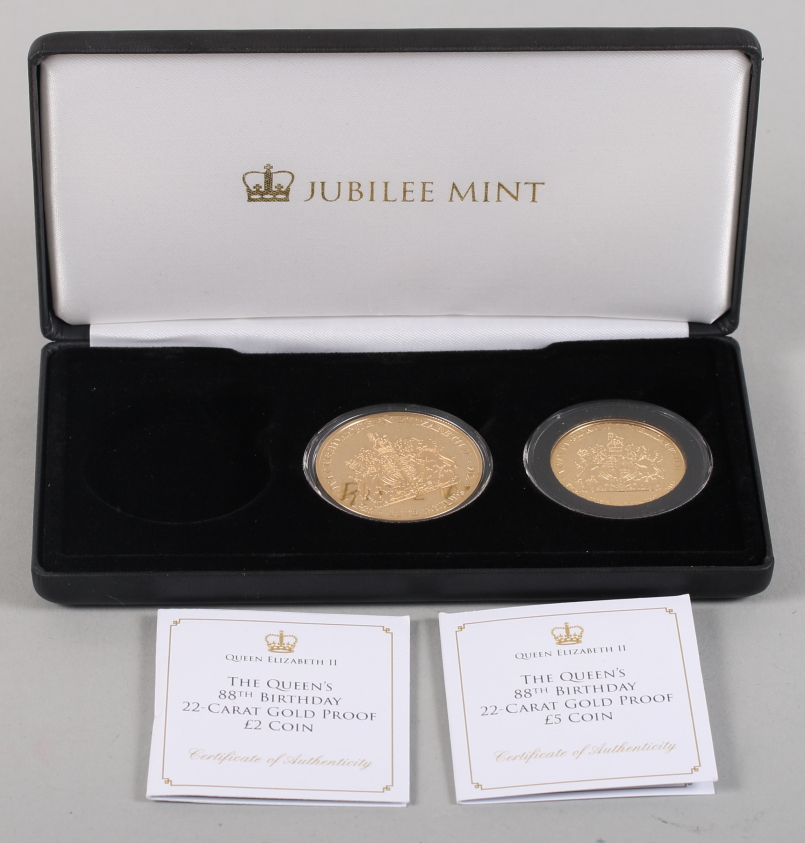 The Queen's 88th Birthday 22-carat Gold Proof £5 coin and a matching £2 coin, in a fitted case,
