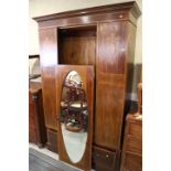 An Edwardian walnut and inlaid wardrobe enclosed centre mirror door over one drawer, 51" wide