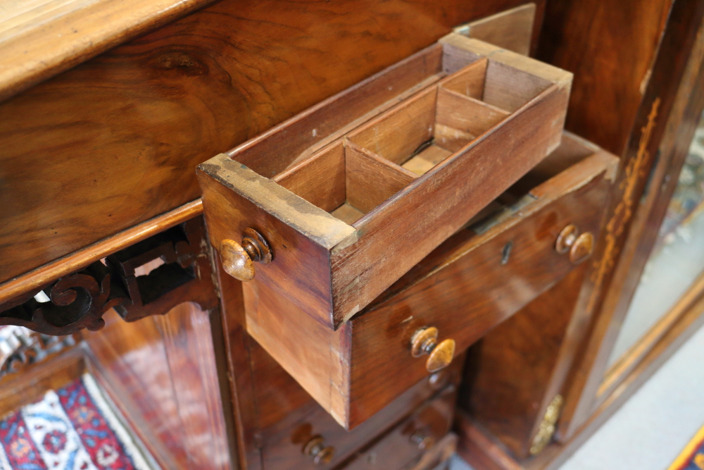 A late Victorian figured walnut Davenport with four side drawers and four faux drawers, on ceramic - Image 3 of 3