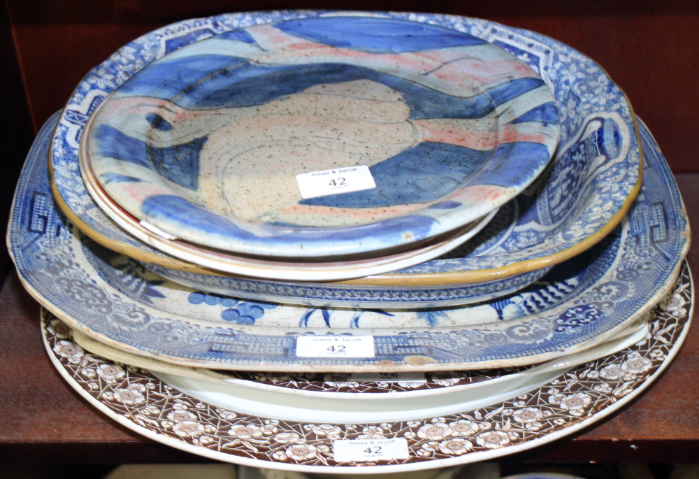 Five 19th century pottery meat dishes, various, a similar oval bowl and two plates