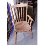 A beech, ash and elm spindle back farmhouse elbow chair