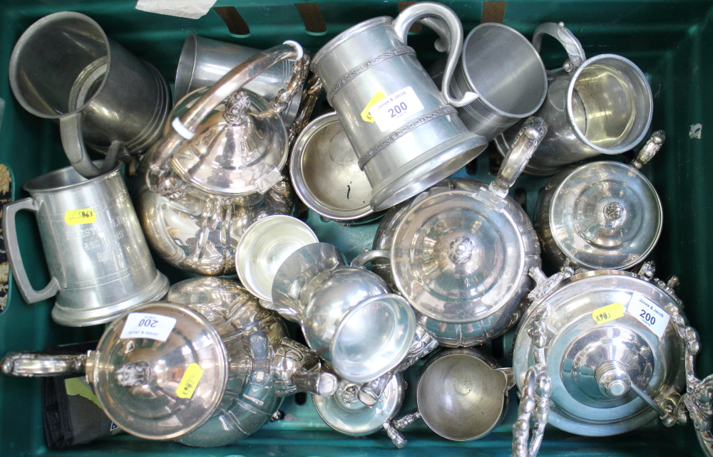 A quantity of silver plate and pewter, including coffee pots, sugar bowls, pewter tankards and other