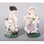 A pair of Danish spill holders, figures in period costume, 6 1/4" high