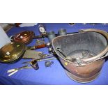 A copper coal helmet, two warming pans, a brass door stop and various other metalwares