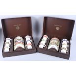 A set of twelve floral decorated bone china coffee cups and saucers