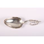 A Danish silver leaf-shaped caddy spoon with scroll handle