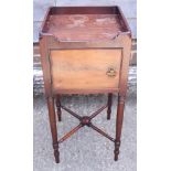 A late 19th century mahogany pot cupboard, on turned supports, 13 1/2" wide x 30" high