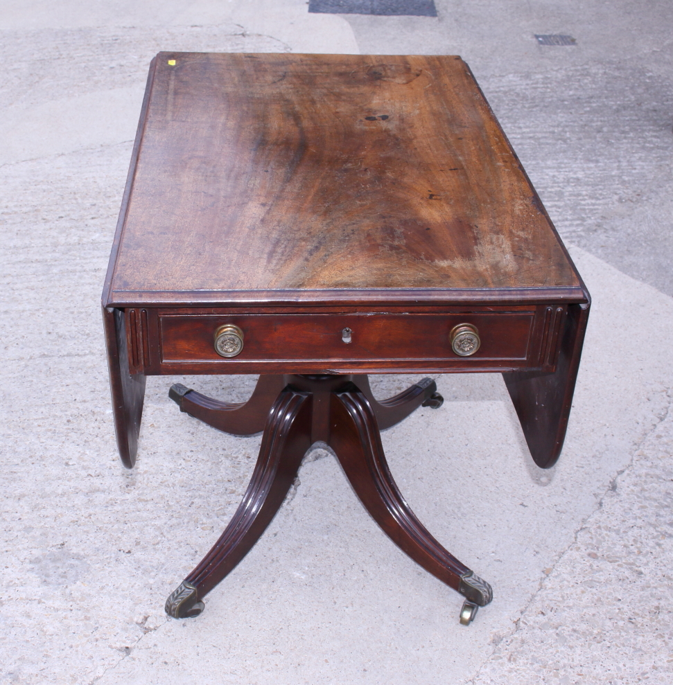 An early 19th century mahogany Pembroke table, fitted one drawer, on turned column and quadruple - Image 2 of 2