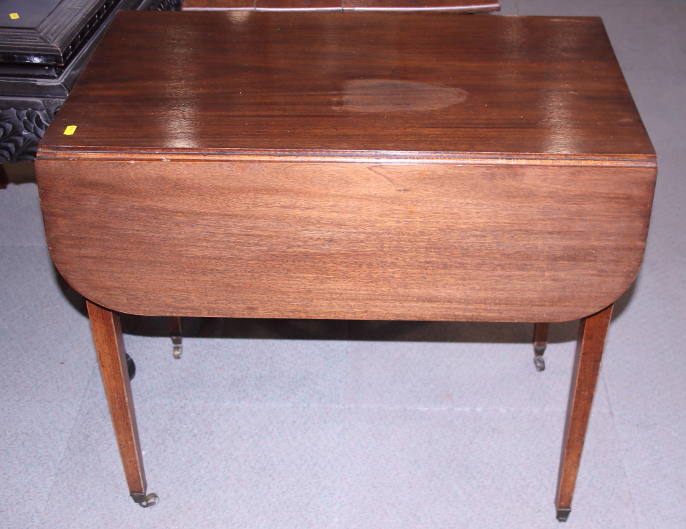 A mahogany Pembroke table, fitted one drawer, on square taper supports, 30 1/2" wide x 18 3/4" deep