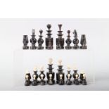 A 19th century horn and ivory chess set, king 2 7/8" tall