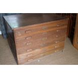 An oak six drawer plan chest, 46" wide x 34" high