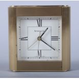 A Tiffany & Co brass cased mantel clock with Swiss movement, inscribed "Winner the Claude Pert Cup