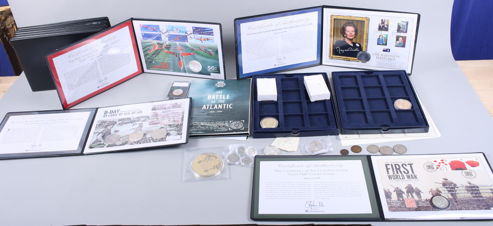 Seven commemorative £5 coins in folios, three others, and various other commemorative and collectors