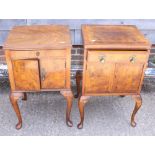 A walnut bedside cupboard with two cupboard doors below a shelf, on cabriole supports, 17" wide x 28