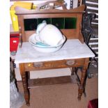 An oak and marble wash stand with raised tiled back and a wash bowl and jug, 30 1/4" x 28 1/2"