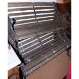 Two slatted seat garden benches with cast metal ends, 42" wide