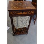 A 19th century Dutch marquetry work table, fitted drawer and well, on turned columns united by an