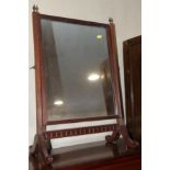 A late Georgian mahogany reeded swing frame toilet mirror, on skeleton stand, 18" wide, and a 19th
