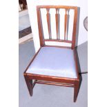 A 19th century mahogany bar back standard dining chair with drop-in seat, on sabre supports, and a