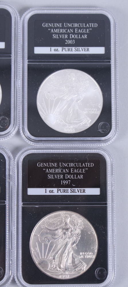 A part set of uncirculated American Eagle 1oz pure silver dollars, in wooden case - Image 17 of 20