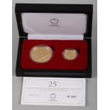 A 25th Anniversary of the Vienna Philharmonic gold coin set, comprising a 1oz 100-Euro coin and a