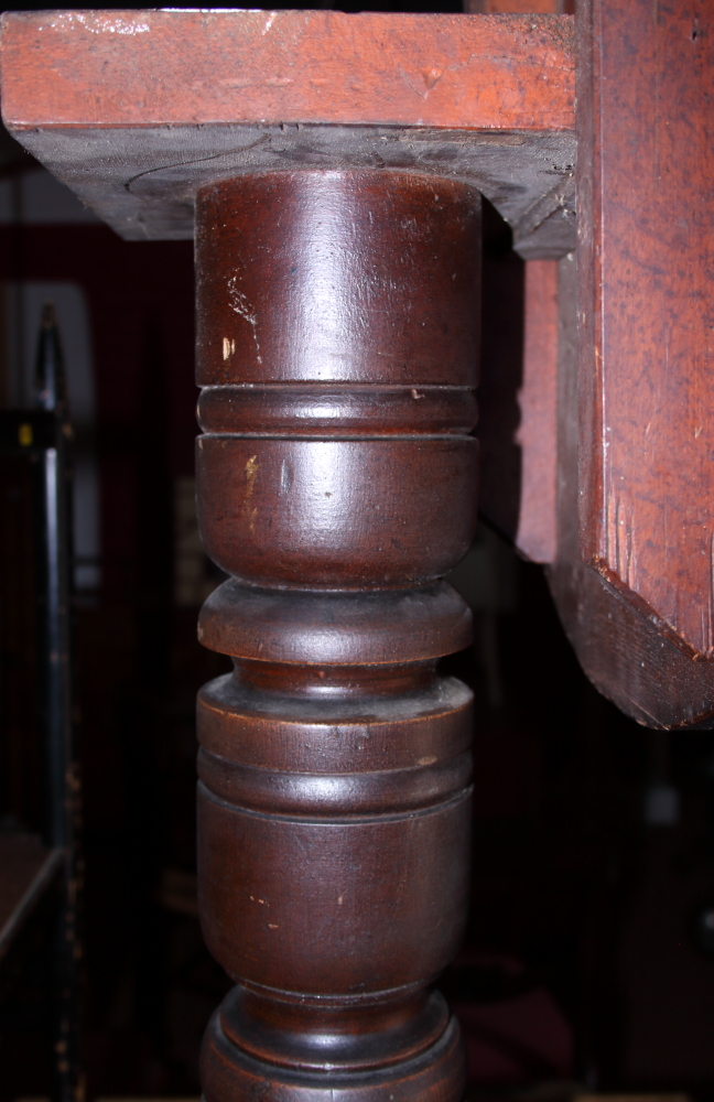 An early 20th century oak tilt top circular table, on three splayed supports (heavy staining to - Image 3 of 3