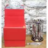 A ruby overlaid glass table lustre and two boxed pieces of Baccarat crystal