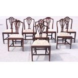 A matched set of eight oak splat back chairs with drop-in seats, on square tapering supports