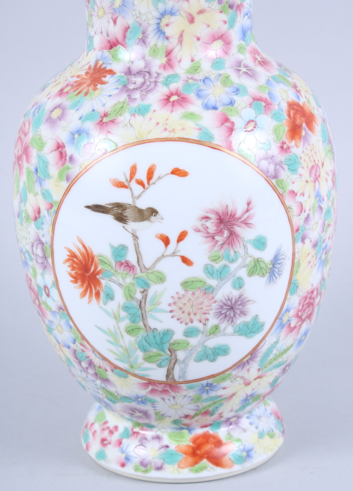 A Chinese porcelain baluster vase, decorated two panels of birds on a millefiori ground, seal mark - Image 2 of 11