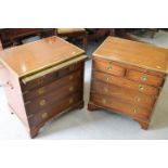 A pair of 20th century mahogany and brass campaign style bedside chests of two short and three