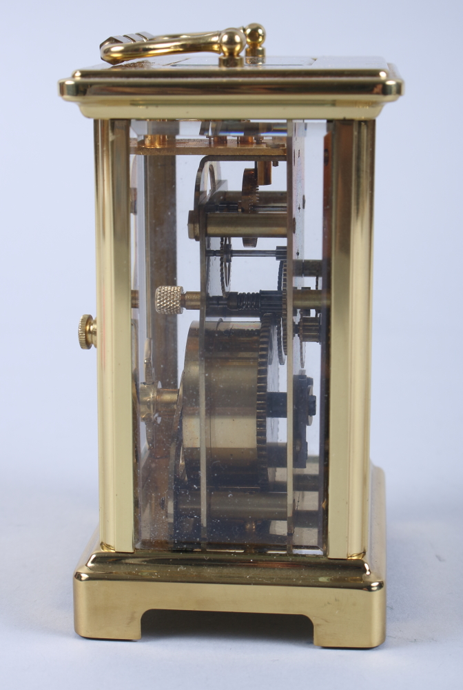 A French gilt metal eight-day carriage clock with seven jewel movement, white enamel dial and - Image 5 of 7