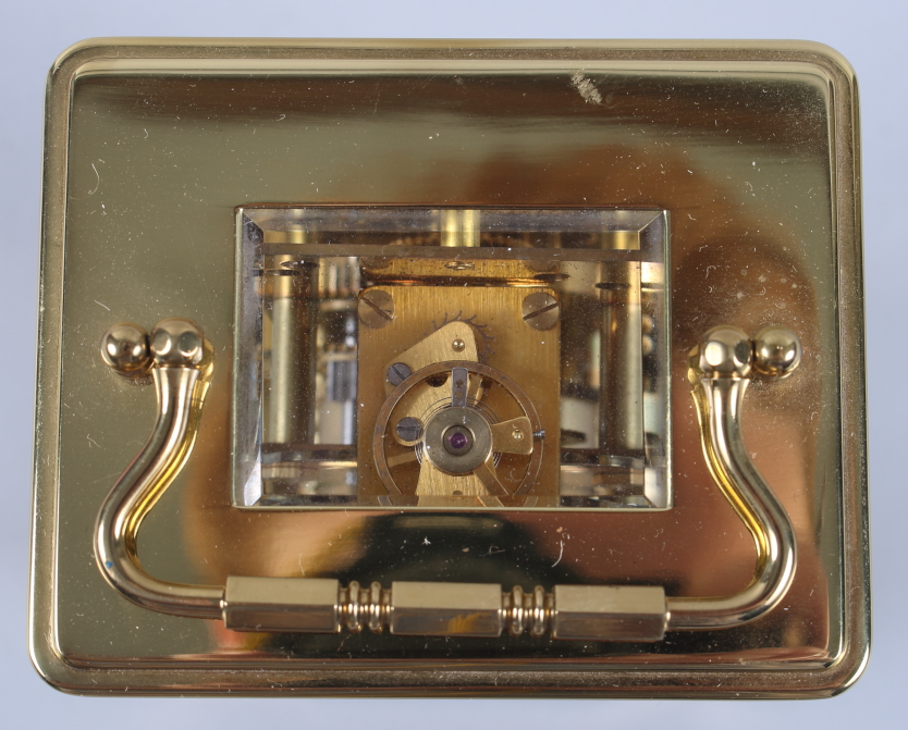 A French gilt metal eight-day carriage clock with seven jewel movement, white enamel dial and - Image 6 of 7