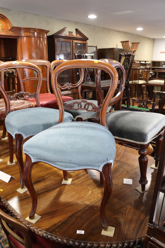 A Harlequin set of six walnut carved bar back standard dining chairs, upholstered in a blue