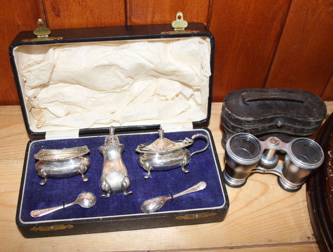 An oval wall mirror, a silver plated three-piece cruet and a pair of opera glasses - Image 2 of 2